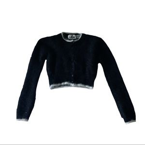 Thrifted cropped black sweater with fury white collar and sleeves at the ends!